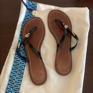 Tory Burch black leather flip flops